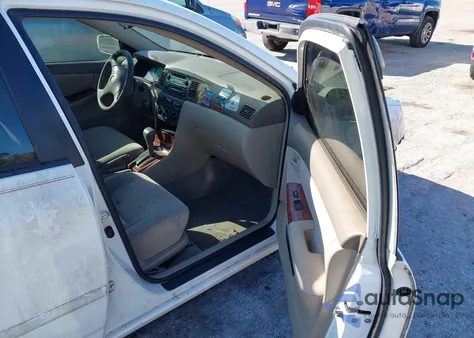 2004 Toyota Corolla Le z USA, uszkodzony, nr VIN JTDBR32E840052765